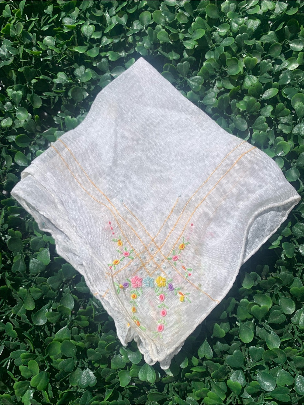 Adorable antique cotton with dainty hand-embroidered bright floral handkerchief